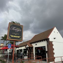 Exterior of restaurant entrance and patio seating 1.23.26