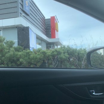 McDonald's - a view of a mcdonald's restaurant from the driver's seat of a car - Fast Food Near Me - Innisfail, Alberta McDonald's - a view of a mcdonald's restaurant from the driver's seat of a car - Fast Food Near Me - Innisfail, Alberta