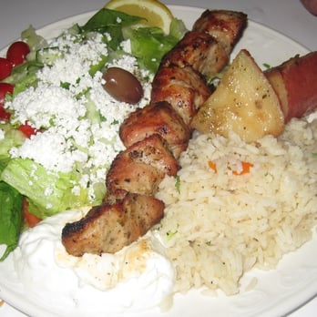 Mezes - Pork Souvlaki Dinner - Served with salad, roast potatoes, and rice - Greek Near Me - Toronto, Ontario Mezes - Pork Souvlaki Dinner - Served with salad, roast potatoes, and rice - Greek Near Me - Toronto, Ontario