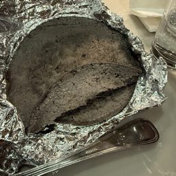 Cracked tortillas, both of them. And cold bland sides with mostly vegetables vs protein (chicken).