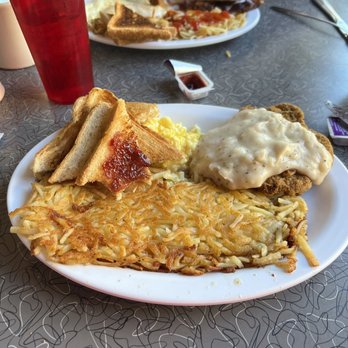 Clover Grill - Chicken fried steak breakfast plate... 2 eggs, huge hashbrown, toast .... - Diners Near Me - New Orleans, Louisiana