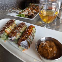 Spring Rolls and shrimp appetizers along with a free glass of pear wine thanks to Yelp check in