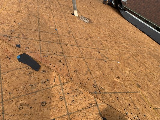 Rushing Roofing & Contracting Logo