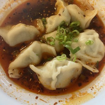 Dumpling World - Spicy and sour shrimp and chive dumplings in a vinegar sauce.  (It's not spicy at all) - Chinese Near Me - Sugar Land, Texas