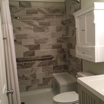 Olde Tyme Craftsmen - a bathroom with a toilet, sink, and shower - General Contractors Near Me - Huntingtown, Maryland Olde Tyme Craftsmen - a bathroom with a toilet, sink, and shower - General Contractors Near Me - Huntingtown, Maryland