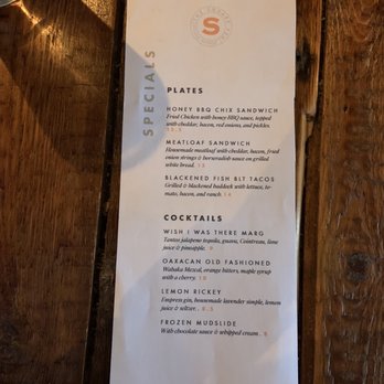 Square Peg - A restaurant menu listing various plates such as honey BBQ chix sandwich, meatloaf sandwich, blackened fish BLT tacos, and cocktails like margarita, old fashioned, lemon Rickey, and frozen mudslide. - American Near Me - Warren, Rhode Island