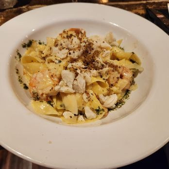 Blacksmith Bar & Restaurant - Hand cut ribbon pasta with lump crab meat and shrimp. - Bars Near Me - Berlin, Maryland Blacksmith Bar & Restaurant - Hand cut ribbon pasta with lump crab meat and shrimp. - Bars Near Me - Berlin, Maryland