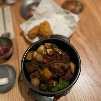 Moono - Huge portion of galbi with potatoes, peppers and rice cakes - Korean Near Me - New York, New York