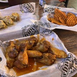 Wings and sweet potato waffle fries.