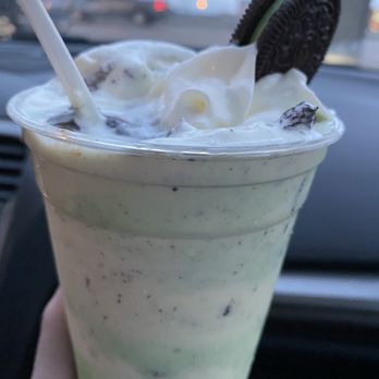 Bobby's Frozen Custard - a hand holding a cup of ice cream and oreo cookies - Ice Cream & Frozen Yogurt Near Me - Maryville, Illinois Bobby's Frozen Custard - a hand holding a cup of ice cream and oreo cookies - Ice Cream & Frozen Yogurt Near Me - Maryville, Illinois