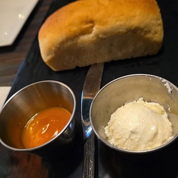 Sisserou's Caribbean Restaurant & Catering - Jamaican hard bread with butter and habanero mango sauce - Caribbean Near Me - Tulsa, Oklahoma Sisserou's Caribbean Restaurant & Catering - Jamaican hard bread with butter and habanero mango sauce - Caribbean Near Me - Tulsa, Oklahoma