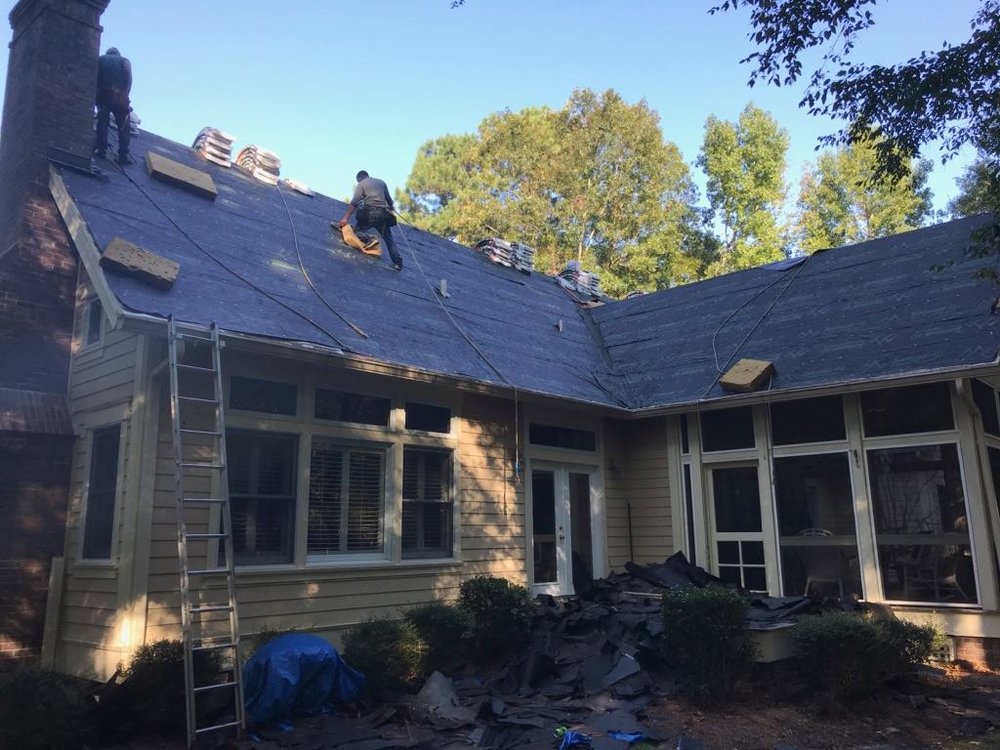 Slide of Total Roofing Solutions and Construction