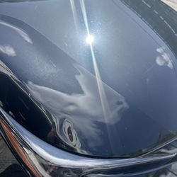 U-Save Car & Truck Rental - Dent on hood corner