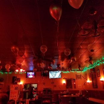 Hot Mama's Canteen - Back dining room decorated for the holidays - American Near Me - Buffalo, New York Hot Mama's Canteen - Back dining room decorated for the holidays - American Near Me - Buffalo, New York