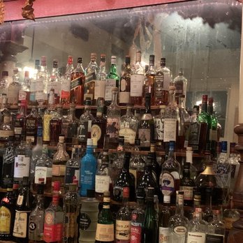 Motor Supply Co Bistro - I realize this is a vintage bar, but a ladder and some windex is desperately needed on that mirror. - New American Near Me - Columbia, South Carolina