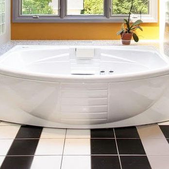 VIP Grout and Tile Concepts - a bathtub in a bathroom - General Contractors Near Me - Clifton Heights, Pennsylvania VIP Grout and Tile Concepts - a bathtub in a bathroom - General Contractors Near Me - Clifton Heights, Pennsylvania