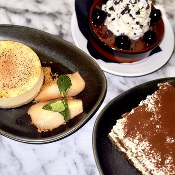 Zio's - Desserts. Zio's tiramisu, Chocolate Budino and Cheesecake with chianti poached pears - Italian Near Me - Las Vegas, Nevada