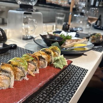 Tatsumi Sushi - Dragon Roll (left) - Sushi Bars Near Me - Austin, Texas Tatsumi Sushi - Dragon Roll (left) - Sushi Bars Near Me - Austin, Texas