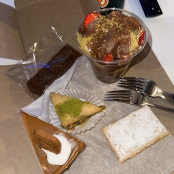 Dessert & Spice - Biscoff Tres Leche Cake Slice, Classic Pistachio Baklava, Viral Dubai Chocolate Strawberry Cup (12oz), Lemon Bar, and Brownie Cookie - Desserts Near Me - Berkeley, California
