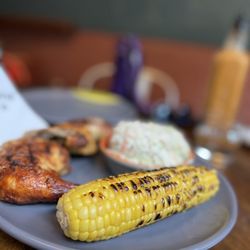 Nando's Peri-Peri - Two chicken Thigh with grilled corn on a cob
