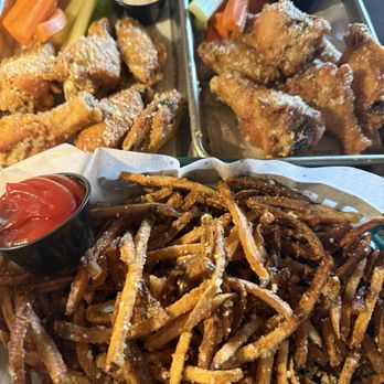 EMRY’s Garden - Garlic, Parm, wings, and truffle fries - Cocktail Bars Near Me - Troy, New York EMRY’s Garden - Garlic, Parm, wings, and truffle fries - Cocktail Bars Near Me - Troy, New York