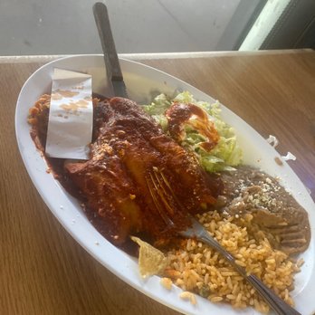 La Parrilla - White paper covering my bite I spit out. Rice and beans tasted like water. - Mexican Near Me - Lisle, Illinois