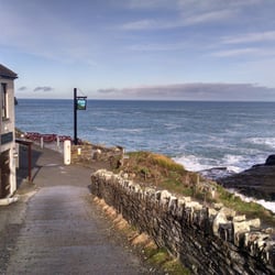 The Port William - View from the parking lot, showing the hotel and the cove.