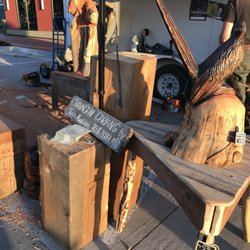 Plano Art Fest - This artist uses a chainsaw to create woodwork.
