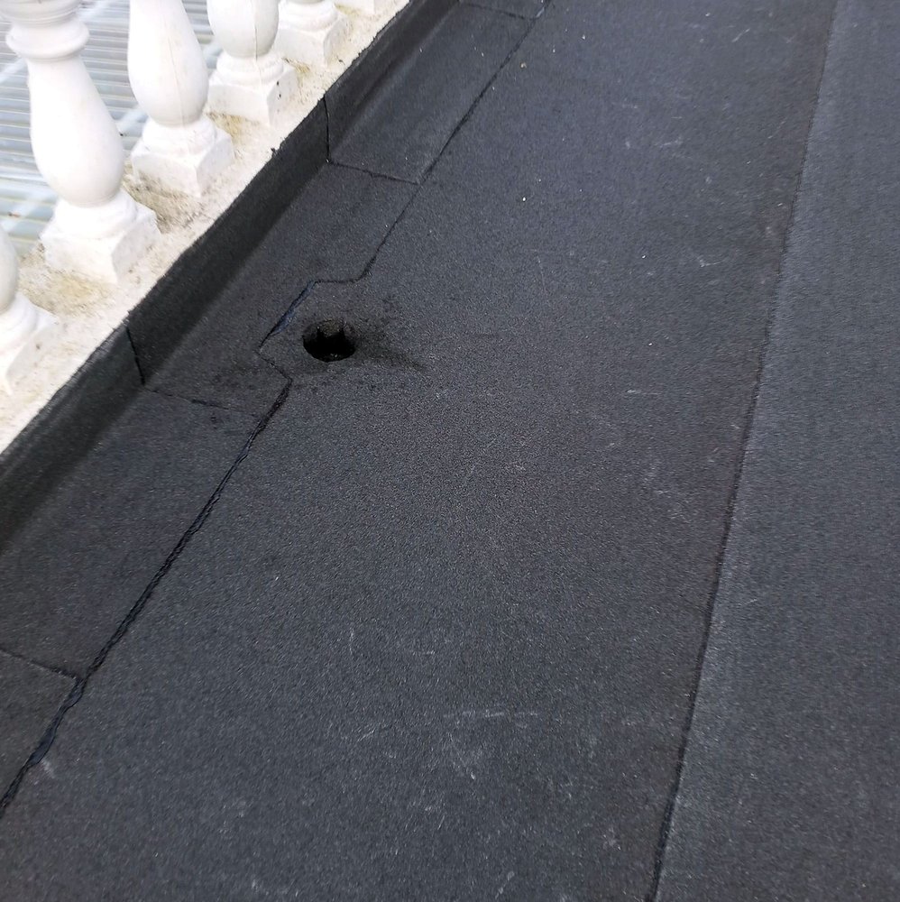 Slide of Pecan Park Roofing