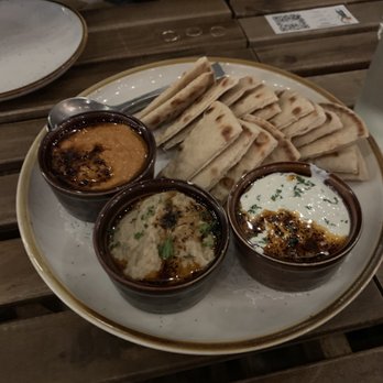 Lokma - Trio Spreads - red pepper hummus, eggplant hummus, tzatziki - Mediterranean Near Me - San Francisco, California Lokma - Trio Spreads - red pepper hummus, eggplant hummus, tzatziki - Mediterranean Near Me - San Francisco, California