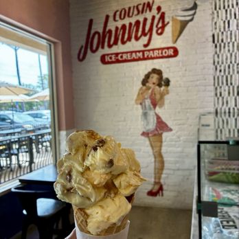 Cousin Johnnys - Delicious Praline ice cream in a waffle cone. - Ice Cream & Frozen Yogurt Near Me - Port Orange, Florida Cousin Johnnys - Delicious Praline ice cream in a waffle cone. - Ice Cream & Frozen Yogurt Near Me - Port Orange, Florida