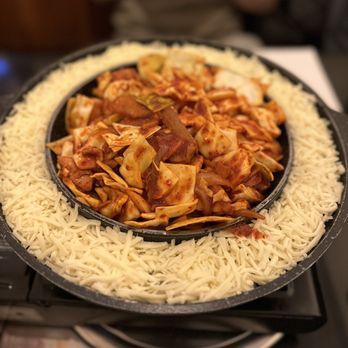 Sikgaek - a plate of food on a table - Korean Near Me - Mississauga, Ontario Sikgaek - a plate of food on a table - Korean Near Me - Mississauga, Ontario