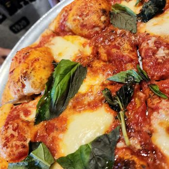 Nostra Tavola - Close-up photo of Margherita pizza - Italian Near Me - Vancouver, Washington Nostra Tavola - Close-up photo of Margherita pizza - Italian Near Me - Vancouver, Washington