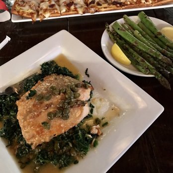 Paisans Pizzeria - Lemon butter salmon w/ capers & spinach, side of asparagus. And Mediterranean flatbread - chicken, olives, onion, feta, & artichokes - Pizza Near Me - Brookfield, Illinois