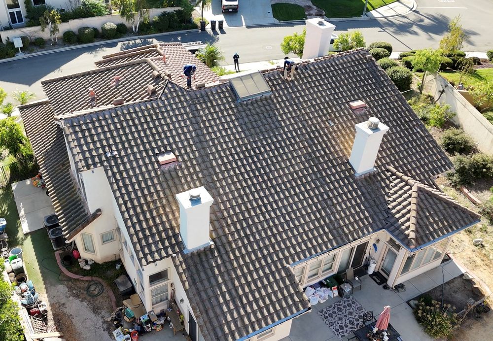 Slide of Twins Roofing