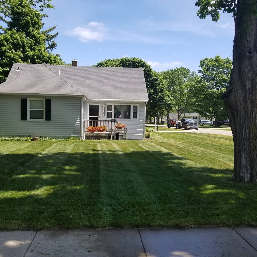 GrassMasters Landscape & Design - tree service in Sparta, MI