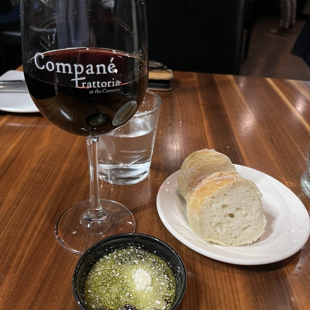 Compane Trattoria - Bread with oil and a glass of Chianti - Italian Near Me - Fairport, New York Compane Trattoria - Bread with oil and a glass of Chianti - Italian Near Me - Fairport, New York
