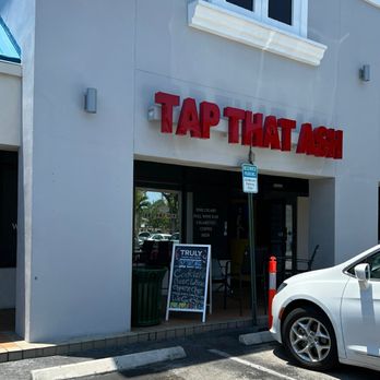 Tap That Ash - a car parked in front of a restaurant - Cigar Bars Near Me - Wilton Manors, Florida Tap That Ash - a car parked in front of a restaurant - Cigar Bars Near Me - Wilton Manors, Florida