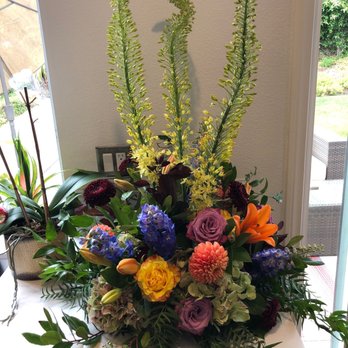 The Flower Shop - Alter piece (after the event, on a counter) - Florists Near Me - Encinitas, California The Flower Shop - Alter piece (after the event, on a counter) - Florists Near Me - Encinitas, California