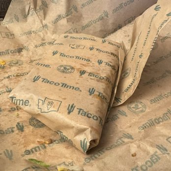Taco Time - A flat taco. I knew something was wrong when I grabbed it and pulled it out of the bag. - Mexican Near Me - Tukwila, Washington Taco Time - A flat taco. I knew something was wrong when I grabbed it and pulled it out of the bag. - Mexican Near Me - Tukwila, Washington
