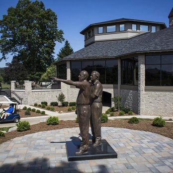 Planted Earth - a statue of a man and a woman in front of a building - Landscaping Near Me - Crestwood, Kentucky Planted Earth - a statue of a man and a woman in front of a building - Landscaping Near Me - Crestwood, Kentucky
