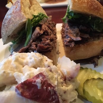 Bowman's Tavern - Roast Lamb Sandwich with a creamy potato salad - American Near Me - New Hope, Pennsylvania Bowman's Tavern - Roast Lamb Sandwich with a creamy potato salad - American Near Me - New Hope, Pennsylvania