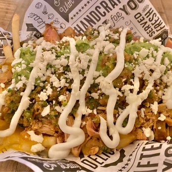 Side Yard Public House - $12.95 Machado Fries with Pollo Asado. Deceptively large! - Sports Bars Near Me - Escondido, California Side Yard Public House - $12.95 Machado Fries with Pollo Asado. Deceptively large! - Sports Bars Near Me - Escondido, California