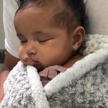 Belleza Lase Ear Piercing Spa - Sleeping with numbing gel on her ears. - Piercing Near Me - Fairfax, Virginia Belleza Lase Ear Piercing Spa - Sleeping with numbing gel on her ears. - Piercing Near Me - Fairfax, Virginia