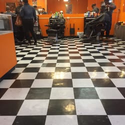 Gentlemen's Edge - Barbers cutting clients
