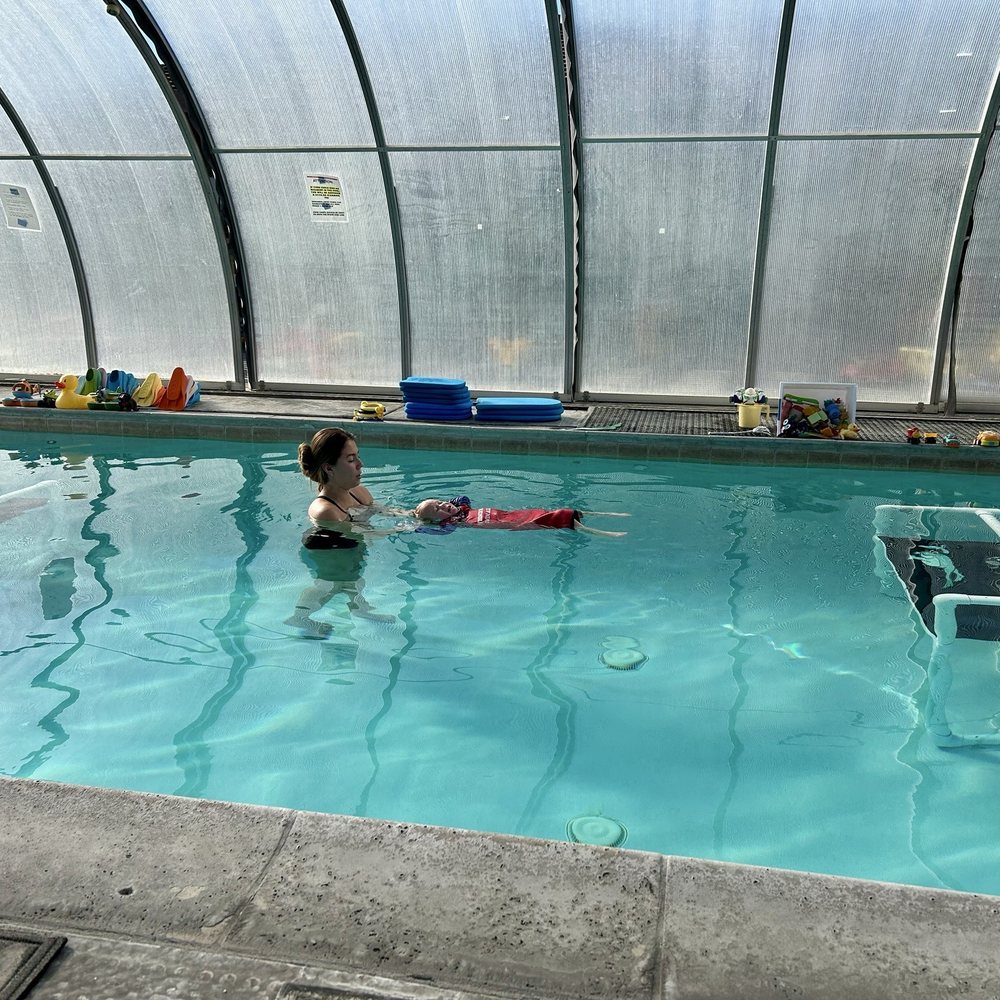 Learning how to float with clothes on. Learning how to float with clothes on.