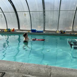 Learning how to float with clothes on. Learning how to float with clothes on.