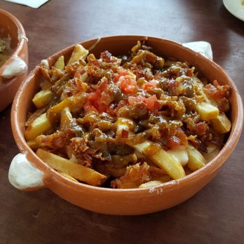 Burgerteca - Chile con queso fries, fantastic! The tomatillo ketchup is delicious! - Burgers Near Me - San Antonio, Texas Burgerteca - Chile con queso fries, fantastic! The tomatillo ketchup is delicious! - Burgers Near Me - San Antonio, Texas