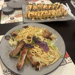 Yakisoba with thick pieces of chicken thigh. Yakisoba with thick pieces of chicken thigh.