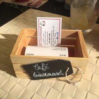 Cafe Gourmand - The check came in this cute little wooden box w their business card! Very lovely and creative - Creperies Near Me - Naples, Florida